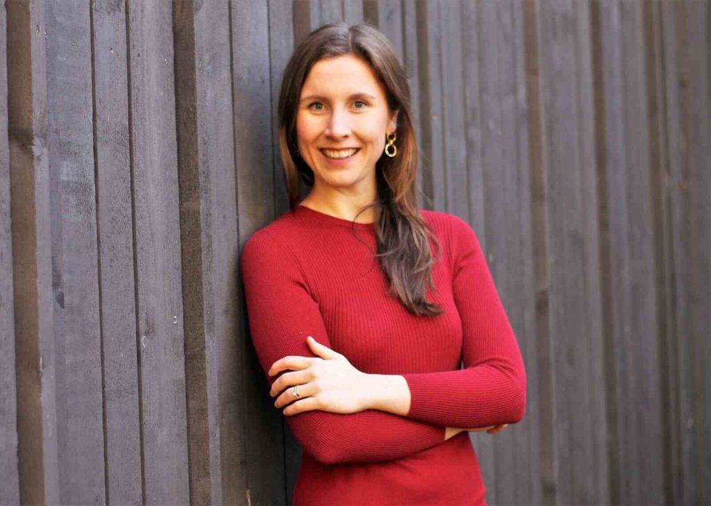 Annika Breu, founder of OH MY! FANTASY, smiling portrait