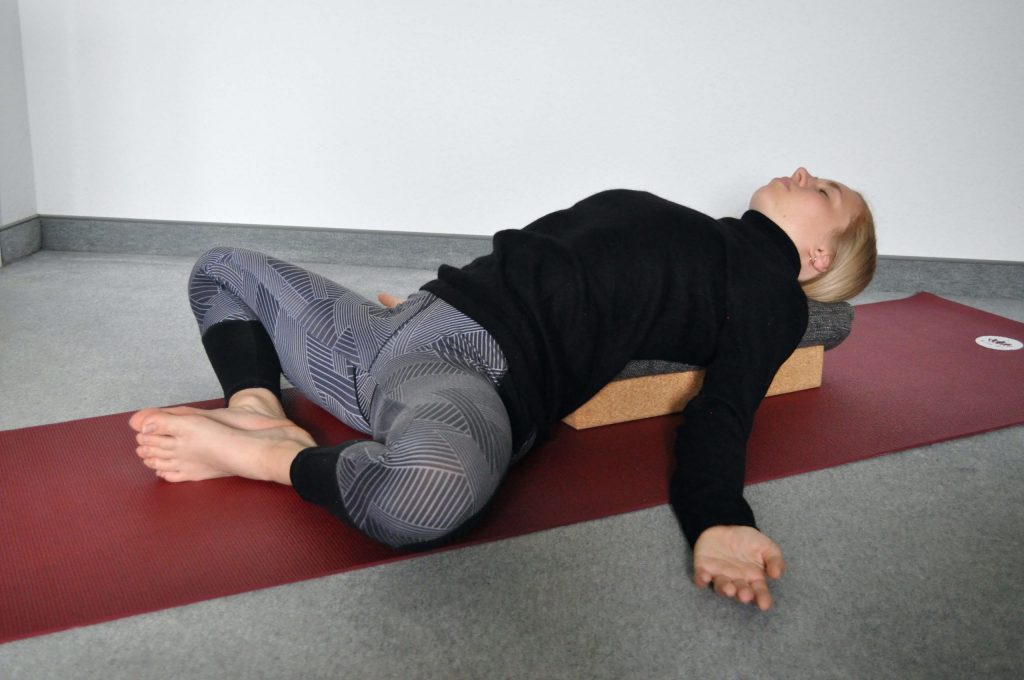 Reclining butterfly with knees open to sides