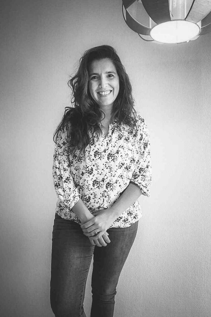 Ariadna smiling in a portrait photo