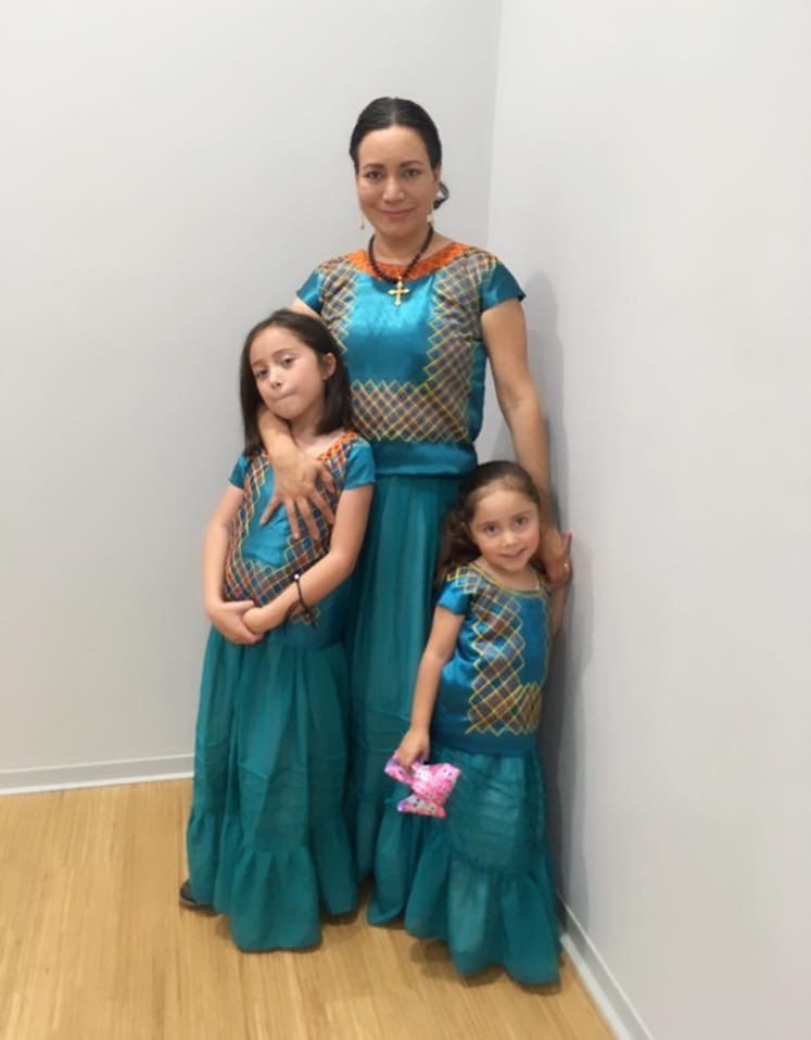 Mari Silvia and her children in a family portrait