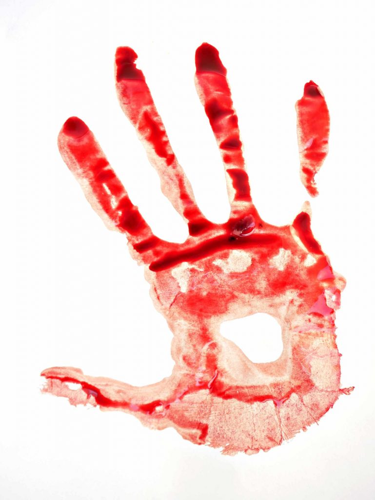 Dried menstrual blood painting shifting from red to brown