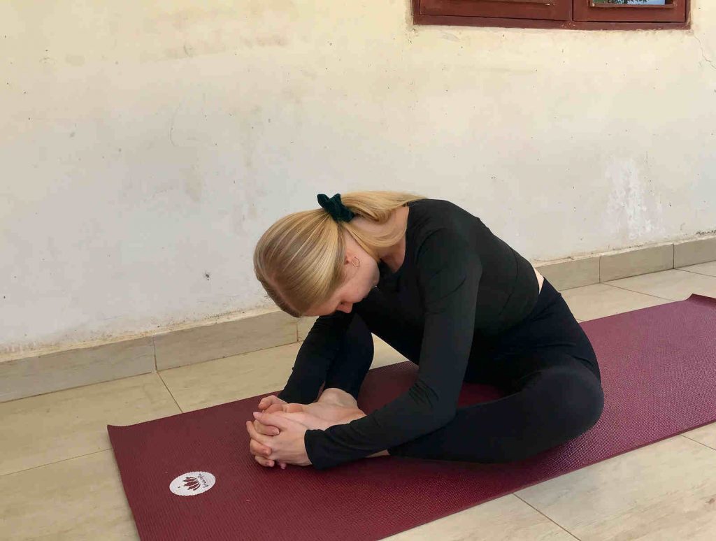 Seated Butterfly (Baddha Konasana) yoga pose for the menstrual winter phase